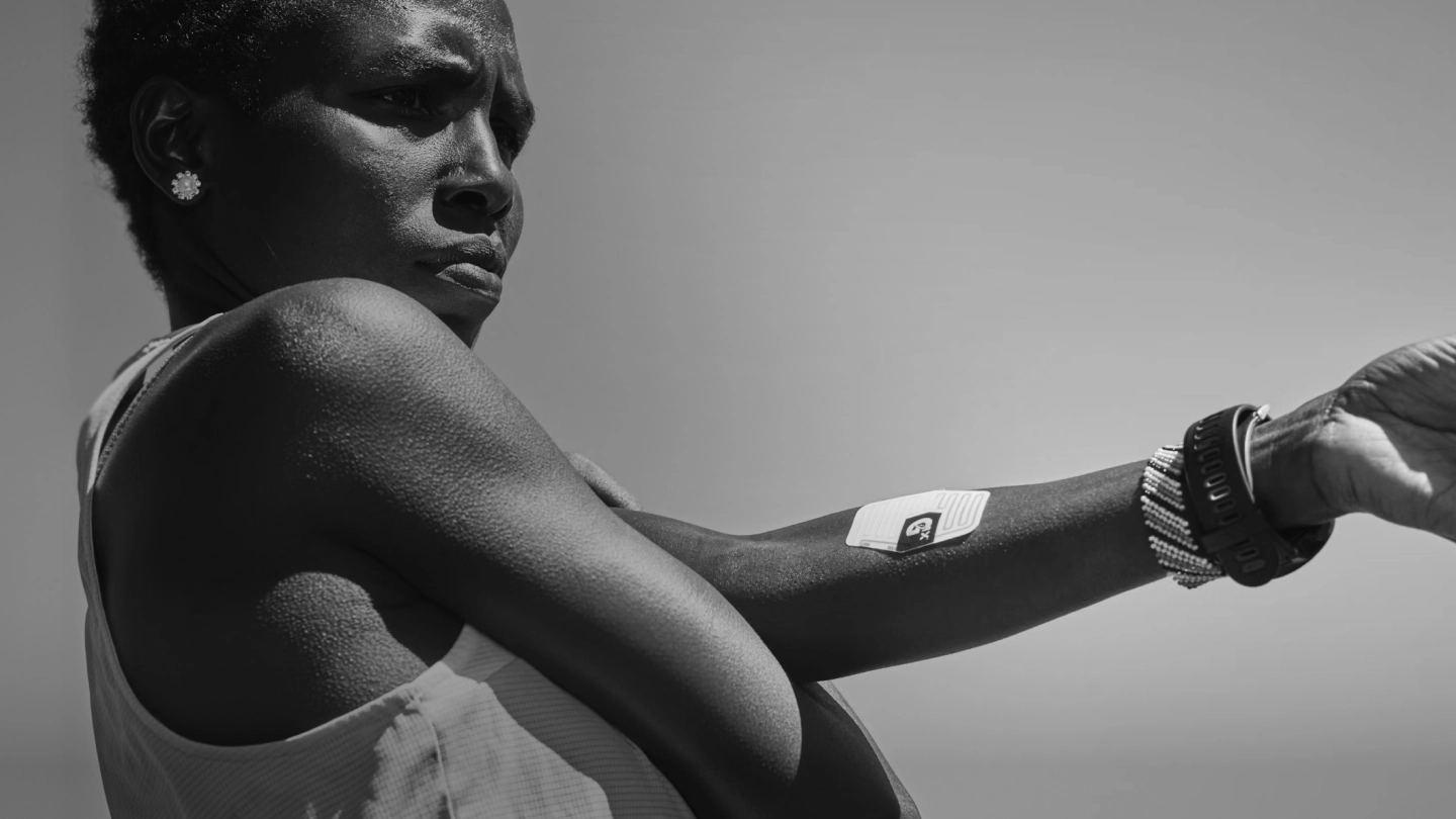 Athlete wearing hydration sensor during workout